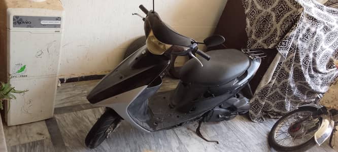 4 stoke petrol scooty