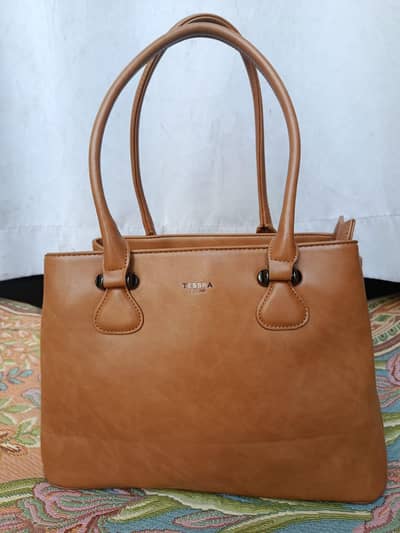 imported bag new price 60000. company tessra Milano