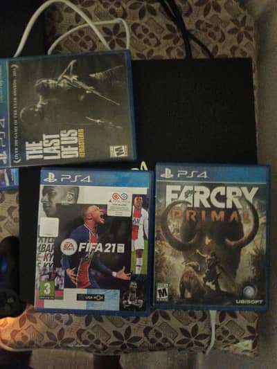 ps4 games the last of us remastered, fifa21 and farcry primal