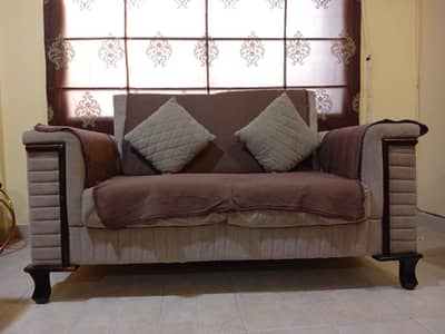 5 seater sofa set with covers  good condition