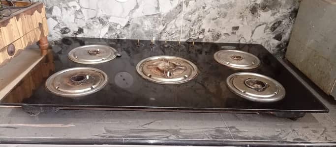 5 burner large size stove almost new and  air hood chimney