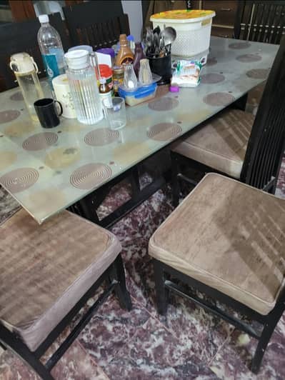 glass dining table with 6 chairs