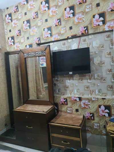 king size bed with side tables and dressing