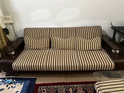 Sofa set along with stools and table