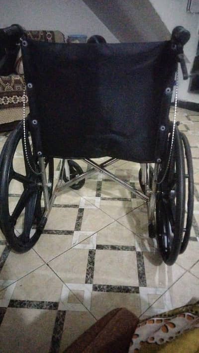 wheel chair with good condition just used five days urjent