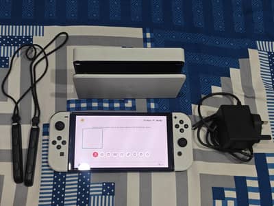Nintendo Switch OLED with Charger, Dock, Joycons Wrist Straps