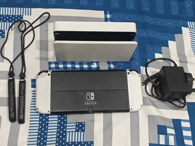 Nintendo Switch OLED with Charger, Dock, Wrist Strap, Pouch, Protector
