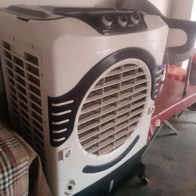 only 1 year use with stand  good condition air cooler