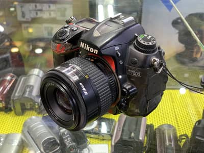 Dslr camera naikon d7000 full kit k sat one year shop warranty 28000/=
