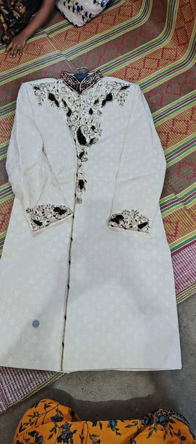 one time used groom shirwani condition 10 out of 10 fabric soot