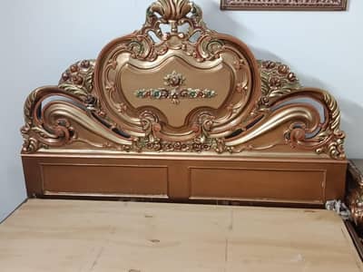 Bed with dressing and side tables
