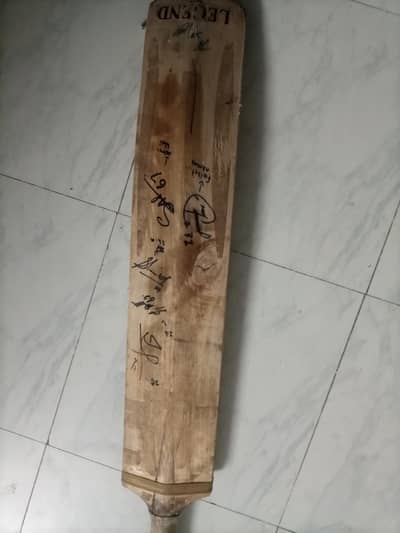 hardball bat with cricketers sign