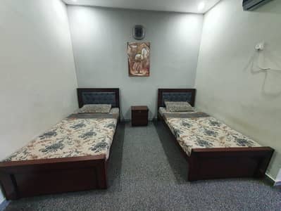 Bed set including mattresses, and a side table