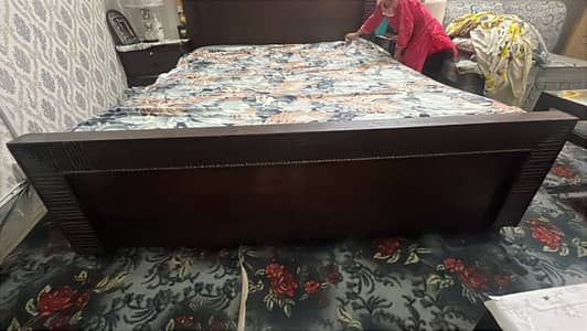Double king size bed with two side tables with mattress