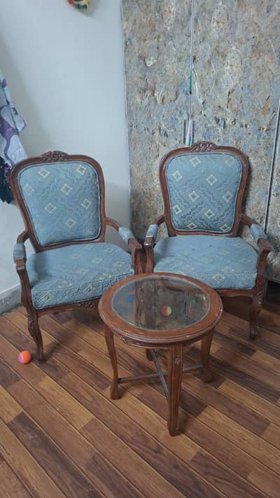 coffee table with chairs