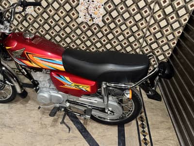 125 red 26 model total genuine