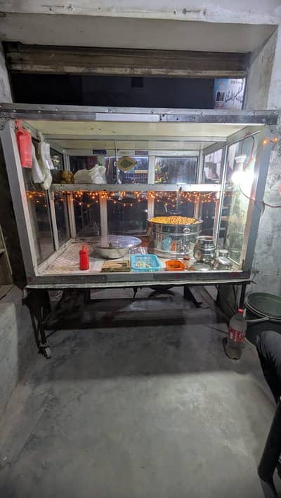 Display counter, pots,talk and all dishes for sale