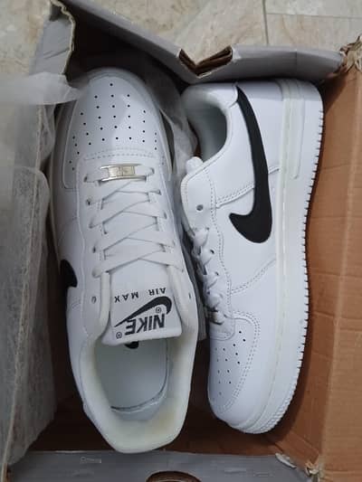 NIKE Air Force with black swoosh