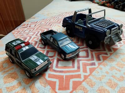 diecast car police SUV and Chev Pickup truck