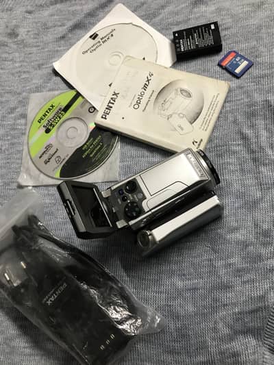 PENTAX OPTIO MX 4 DIGITAL HYBRID CAMERA/CAMCORDER with box