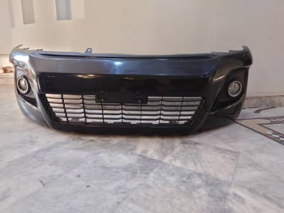 Toyota Revo v Genuine OEM Pumper with Fog lights & Grill