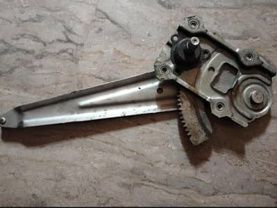 Front door window regulator machine for a Suzuki Wagon R VXR