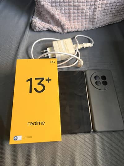 Realme 13 Plus with complete box and 9 months warranty.