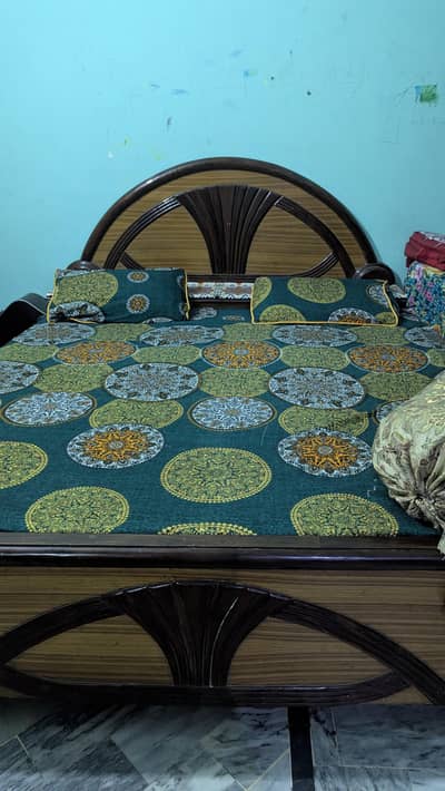 wooden bed with metres condition 10/7