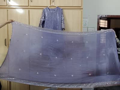 Lilac Elegance This exquisite lilac outfit is a perfect blend of