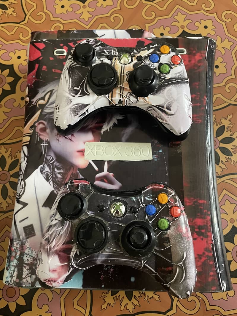 Xbox 360 with two controllers 1