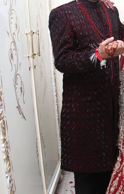 groom Georges shirwani with qula ,mala and khusa