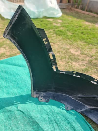 Hyundai Tuscan rear bumpers, painted and black are available for sale