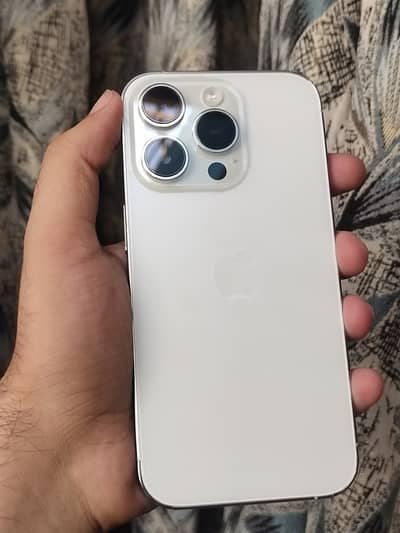 Apple iPhone 14 Pro with adapter & cable.
