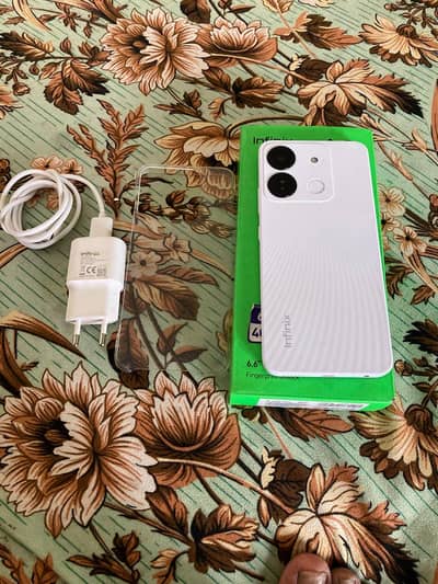 Infinix Smart 7 with box charger complete