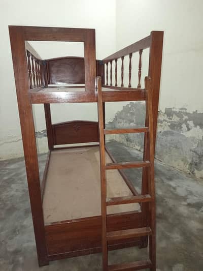 twin over wooden  bed