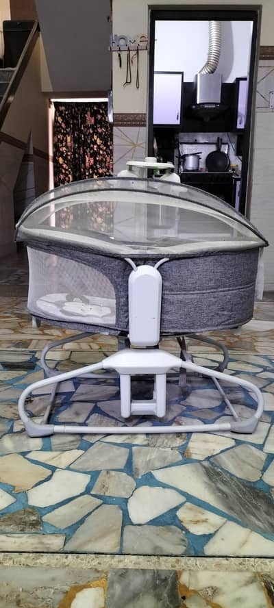 Mastela 4 in one , slightly used swing ,rocker ,baby cot with music