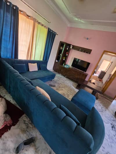 L shaped sofa with puffy in good condition 6 months used only