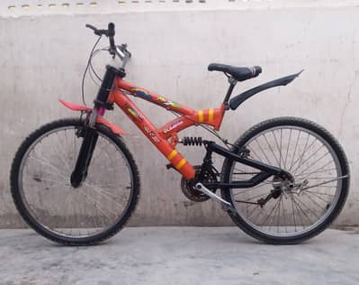 26 inch double shock jumper cycle orange