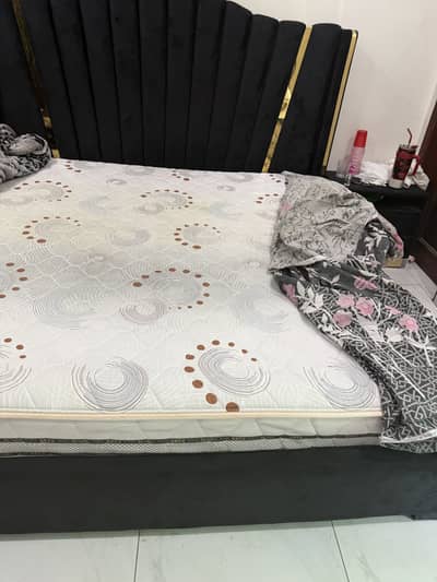 King size bed with two table