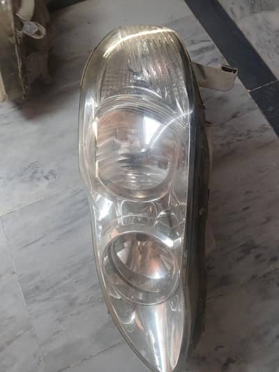 corolla 2006 model head lights original