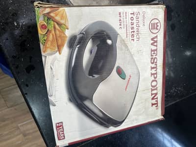 West Point sandwich maker , very less used, excellent working