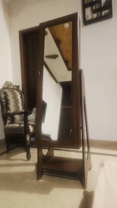 standing  mirror with storage in perfect condition.