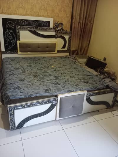 bed and 2 sides table with mattress