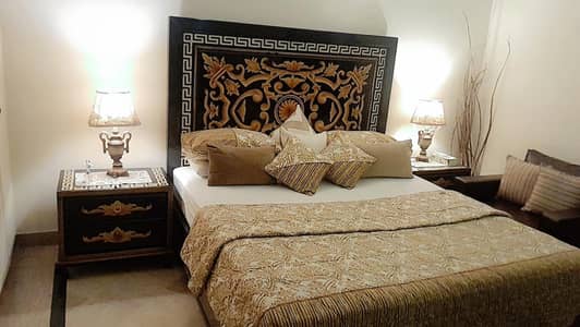 double bed with two side tables n dressing table