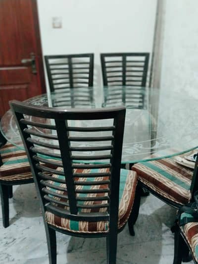 Glass Surface Dinning Table with 6  soft seated Chairs