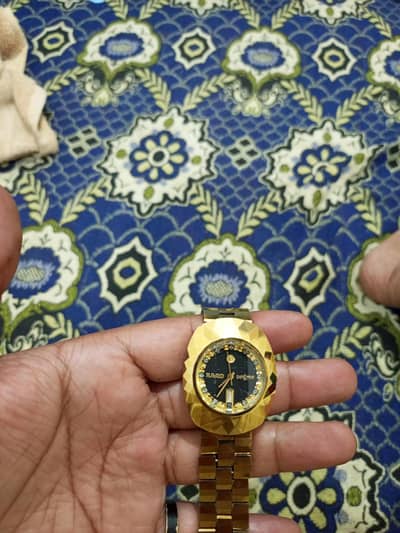 rado diastar original gold colour