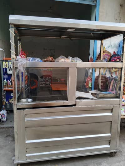 Burger shawarma roll and zinger fryer counter