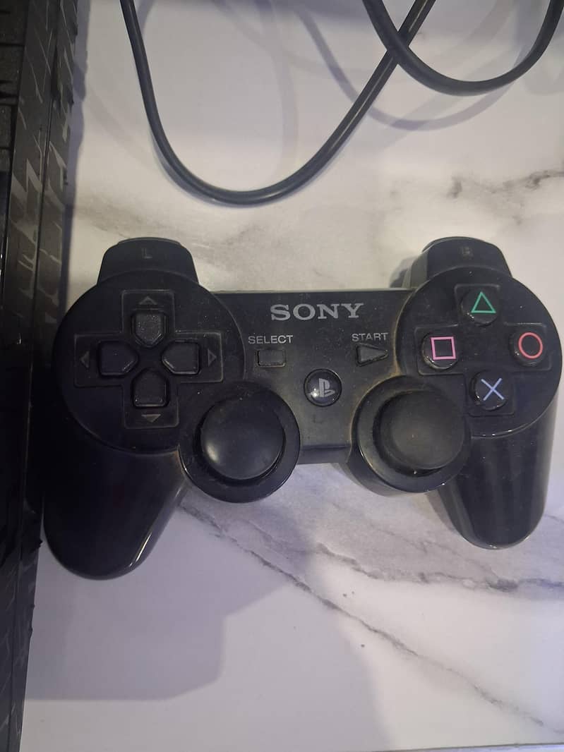 PS3 WITH 3 CONTROLLERS 3