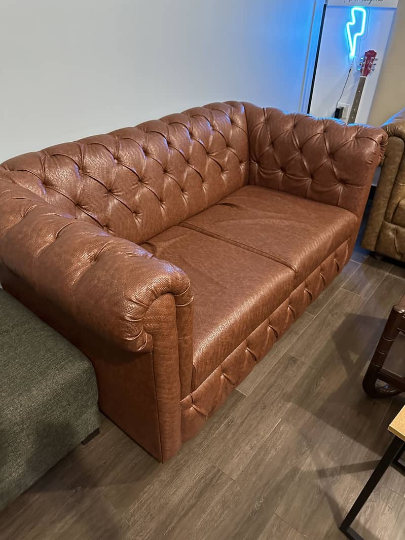 2 sofas (2 seater each) 0