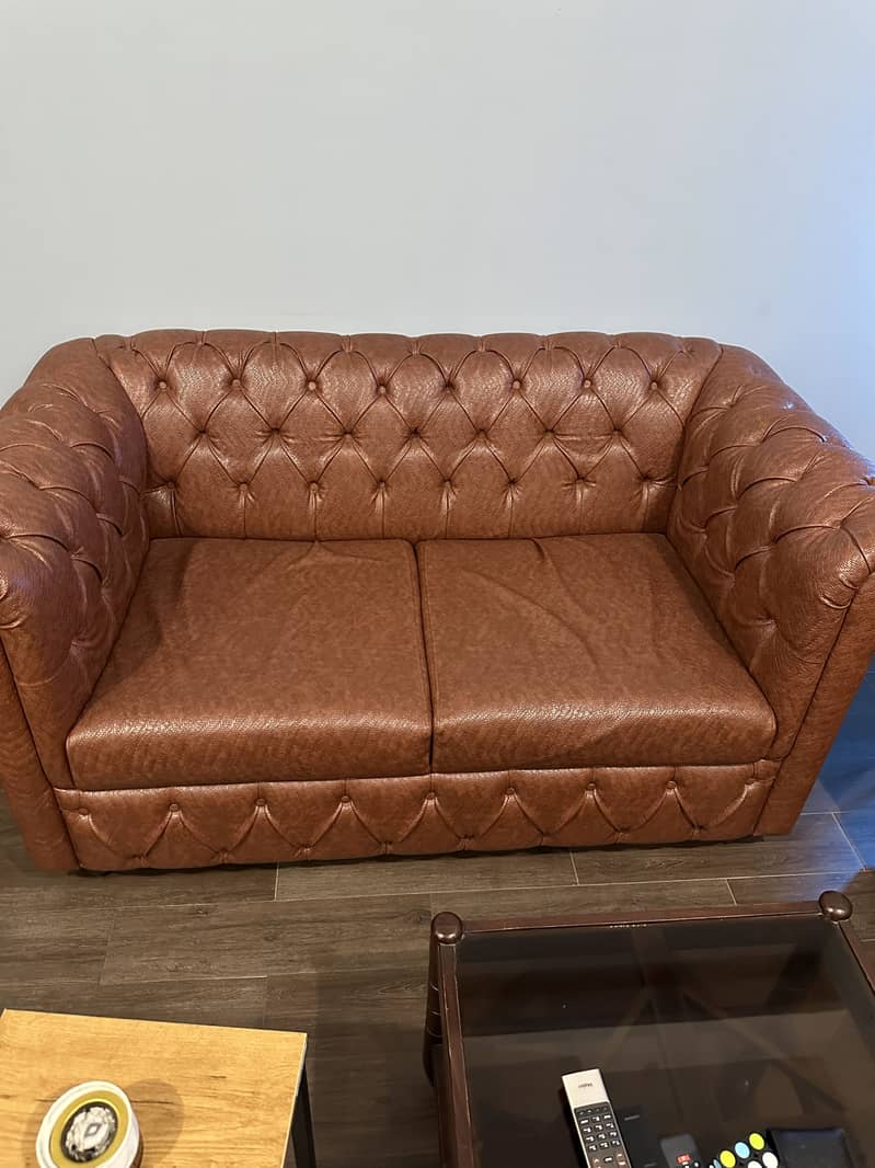2 sofas (2 seater each) 1